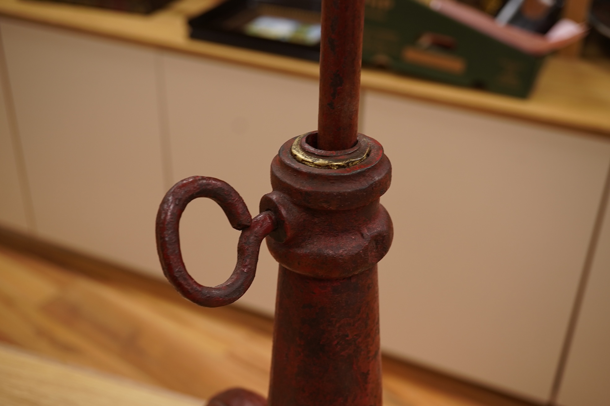 A 19th century red japanned (heavy) cast iron telescopic tripod base, 63cm minimum